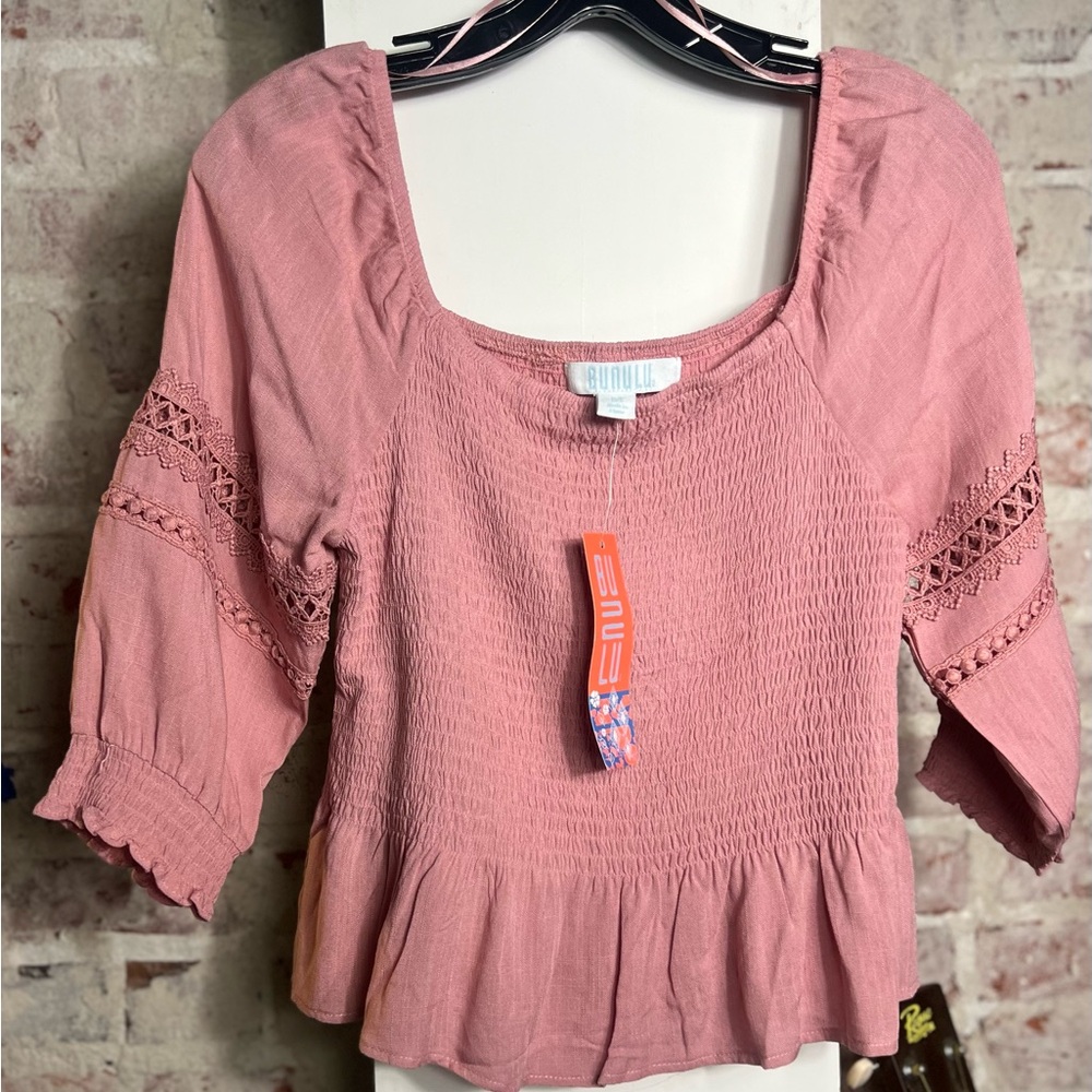 Cute never worn smocked top.